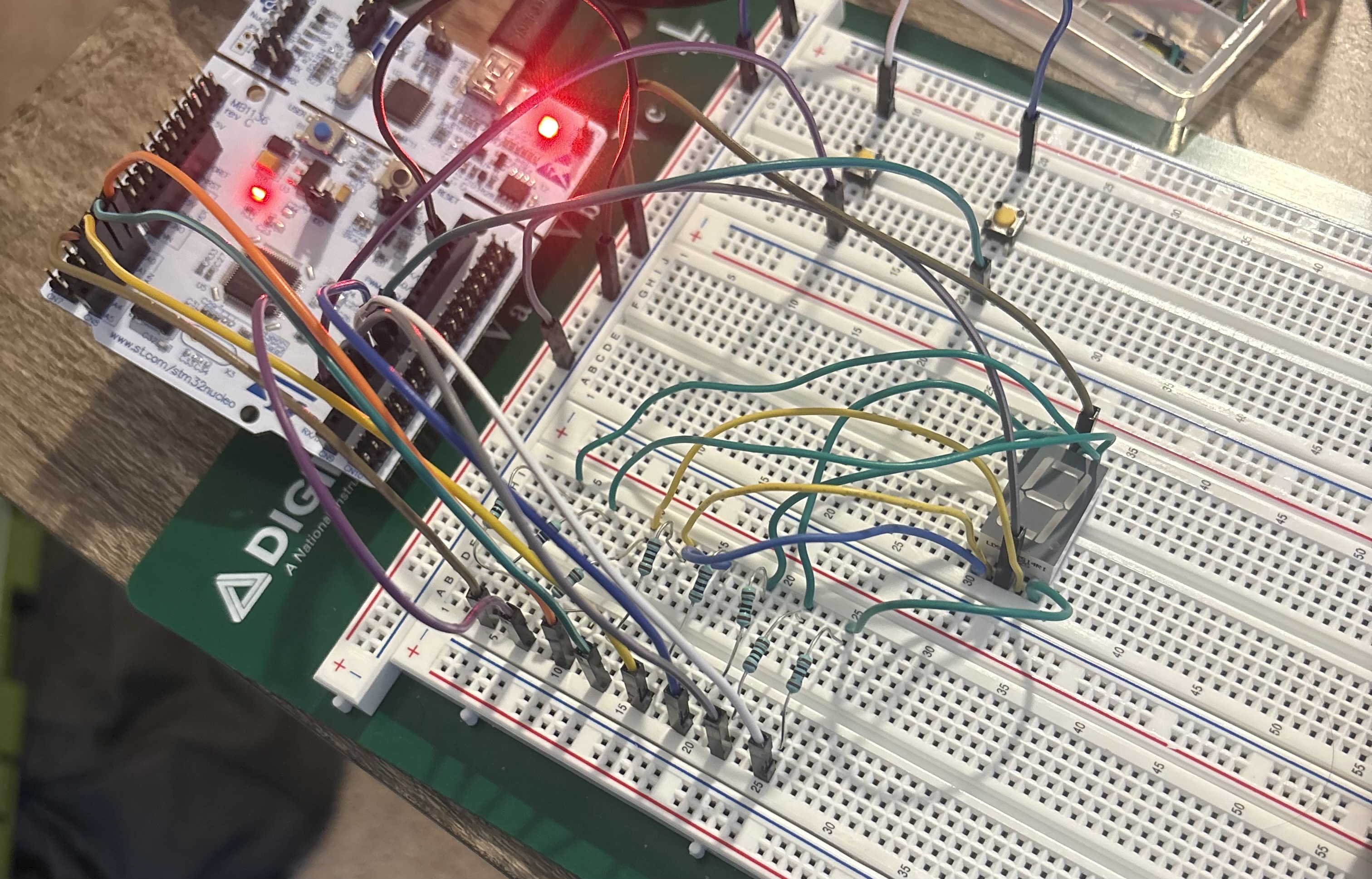 STM32 Nucleo wired to breadboard with 7-segment display
